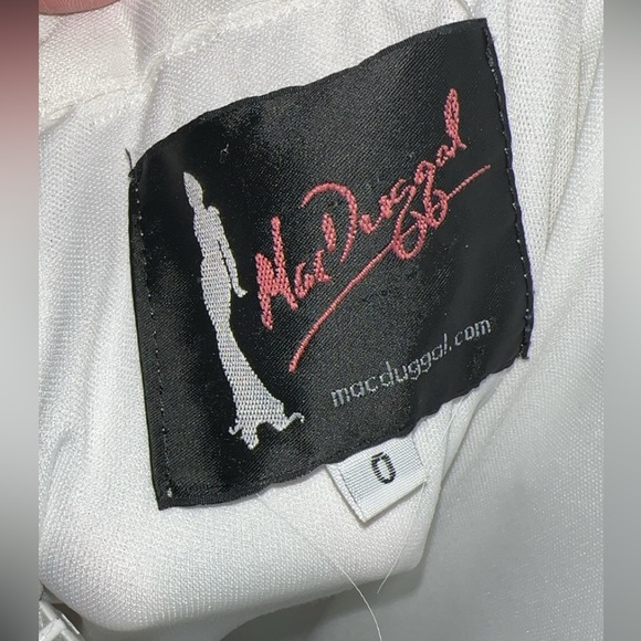 White Beaded Two Piece
ONLY WORN ONCE 
No flaws 
Yoga Pant material - Picture 4 of 4